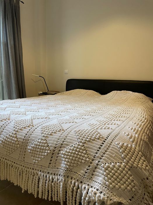 Colcha de renda feita à mão