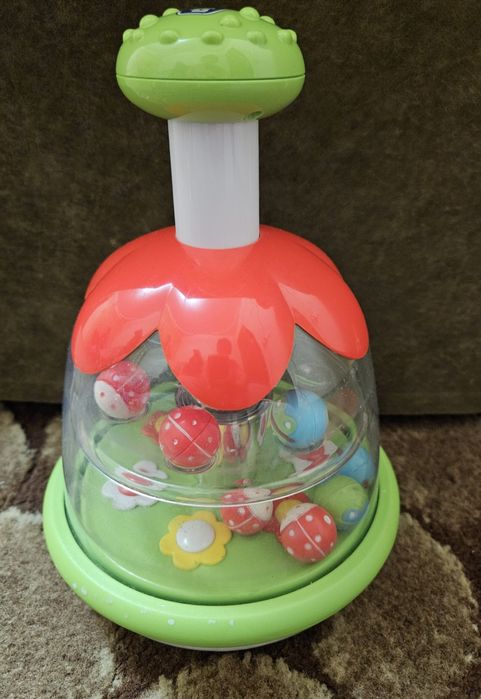 Игрушка Chicco "Юла-радуга".