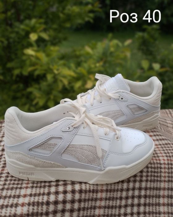 Продаж білих кросівок Puma