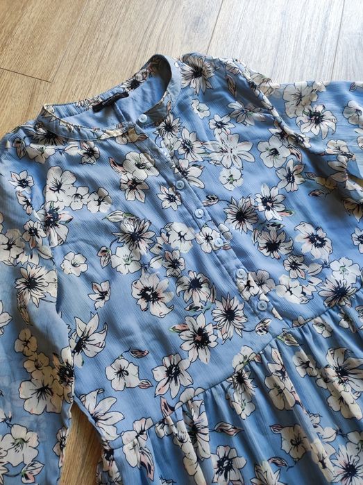 Damska błękitna sukienka w kwiaty falbany r 38 M
