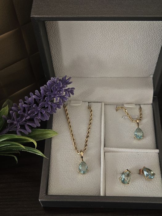 Conjunto em aço dourado colar,pulseira e brincos