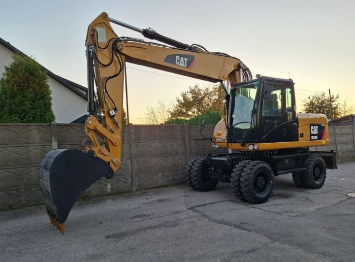 Caterpillar M316D  Caterpillar M316D, rok 2012, Cesja Leasingu, 238k netto