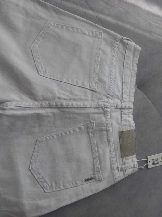 Spodnie jeansy nowe białe