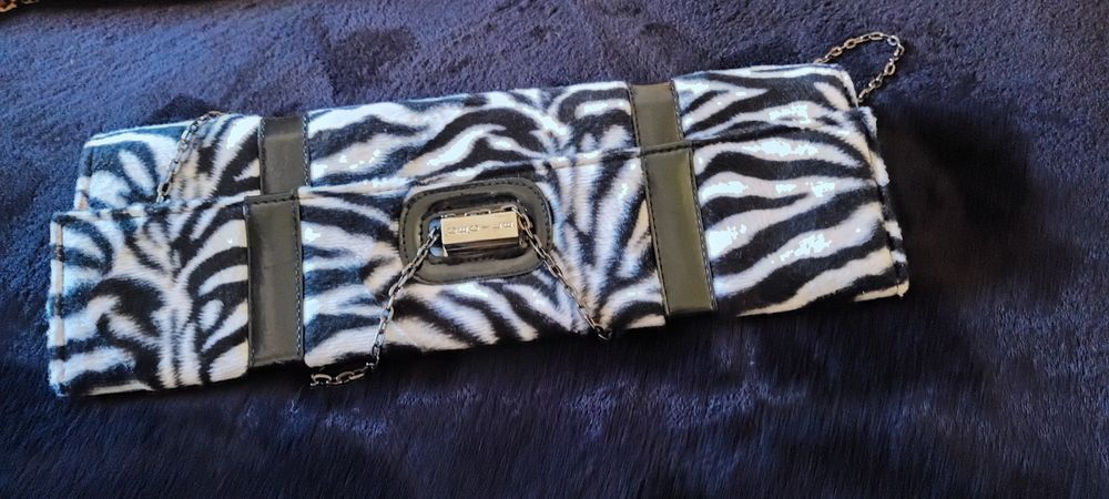 Conjunto de 3 pecas:leggins, tunica vestido com oferta de Clutche.