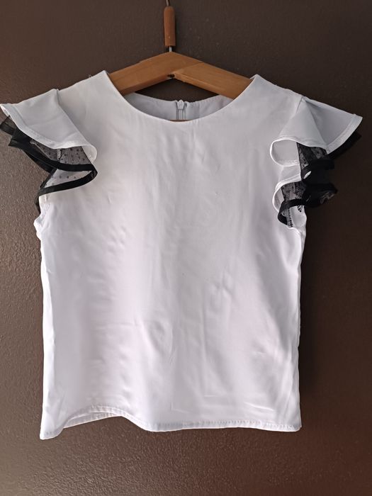 Продам нарядні блузи для дівчинки