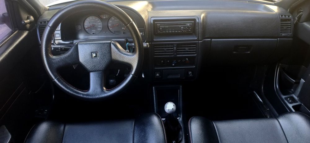 Ax GTi bom estado  teto pele
