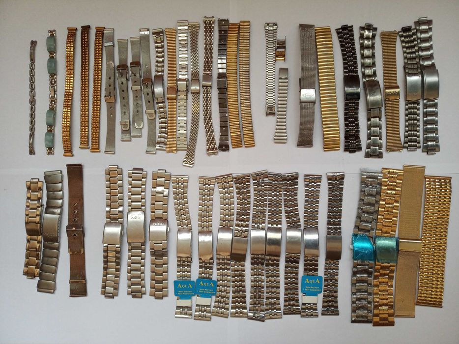Металеві браслети до годинників