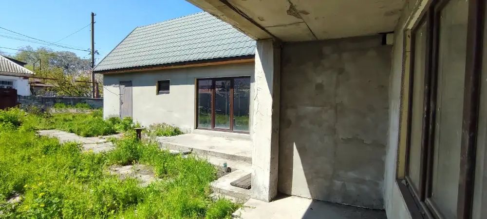 продам дом новой постройки район ж/м Коммунар