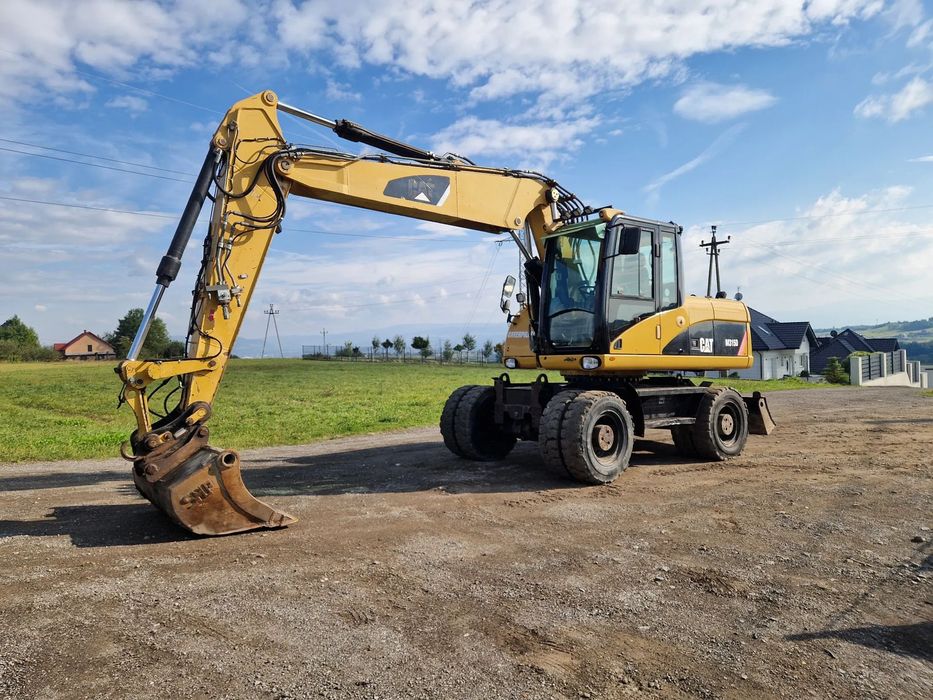 Caterpillar Cat 315 D  Koparka kołowa Cat 315 D