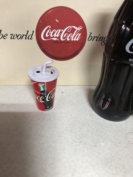 Coca cola. Caco calo. Isqueiro