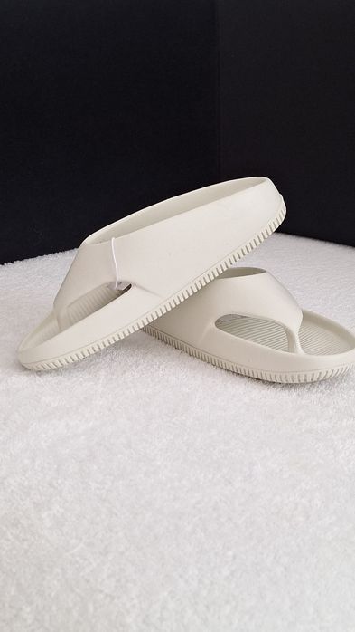 Тапки W Nike Calm Flip Flop,  FD4115 003 US7 EU38  24cm