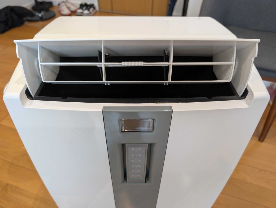 Ar condicionado portátil em excelente estado com bomba de calor.