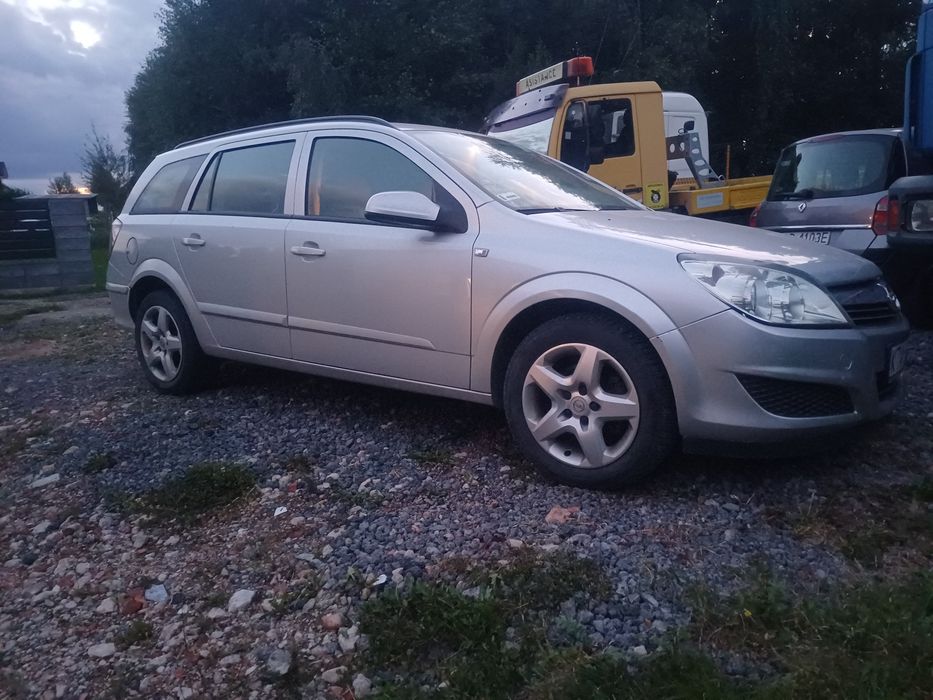 Drzwi prawe astra H kombi z157 lift kompletne