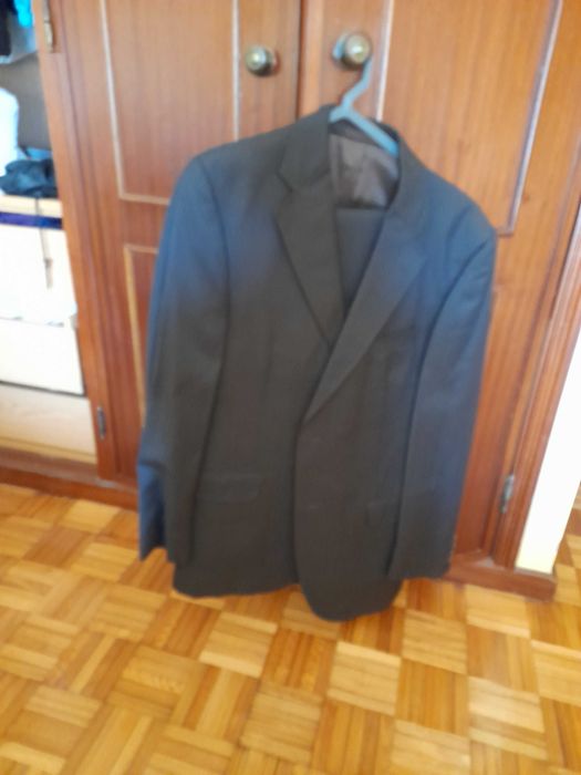 Vendo fato castanho como novo
