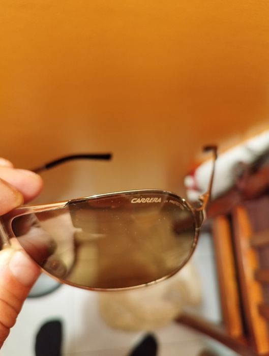 vendo óculos  de sol Carrera originais em bom estado.