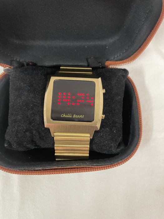 Relogio chilli beans dourado