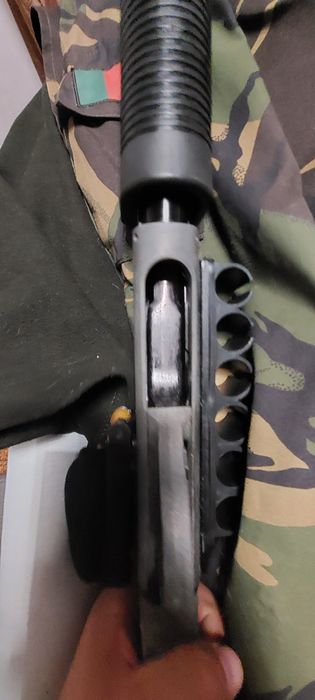 Vendo shotgun airsoft bom estado
