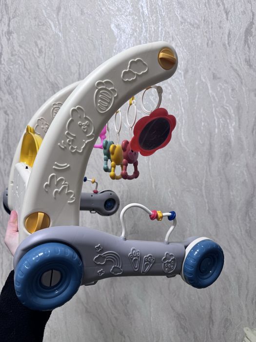 Розвиваюча іграшка та ходунки  музичні