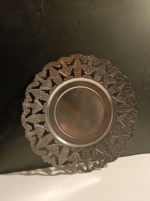 Pequeno prato decorativo em inox