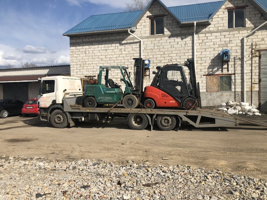 Киев эвакуатор Перевозим Легковые автомобили сельхоз технику