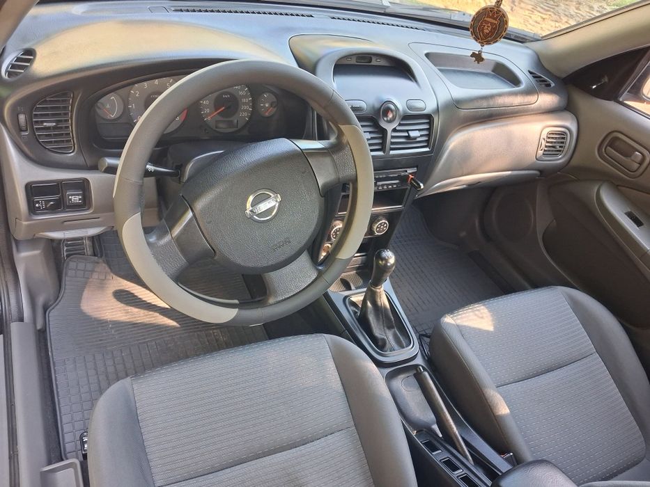 Продам Almera Classic 2011 VIN KNMCSHLMSCP879987 фото оголошення 7 з 8