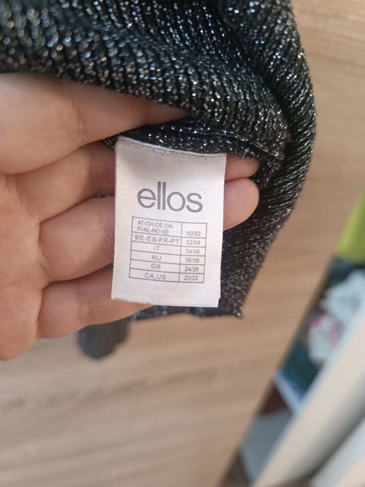 Damski czarny sweter elegancki ze srebrną nicią