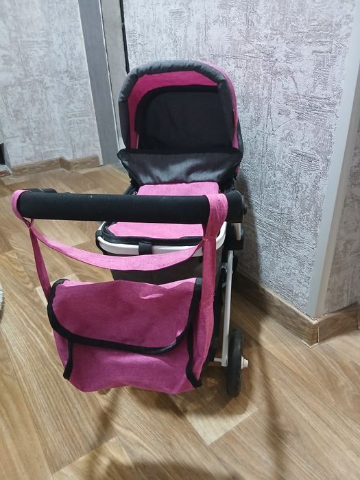 Детская коляска для кукол.