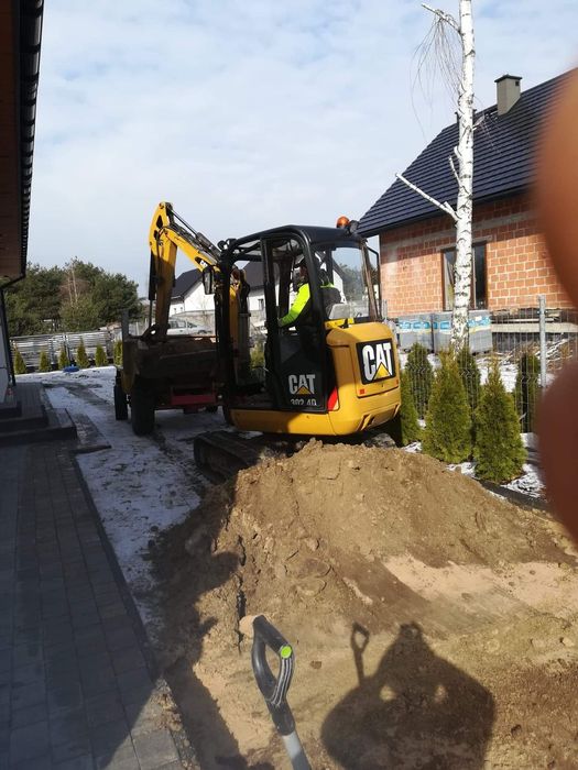 Minikoparka usługi