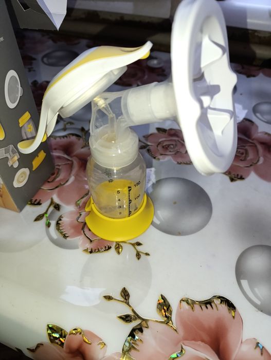 Механический молокоотсос