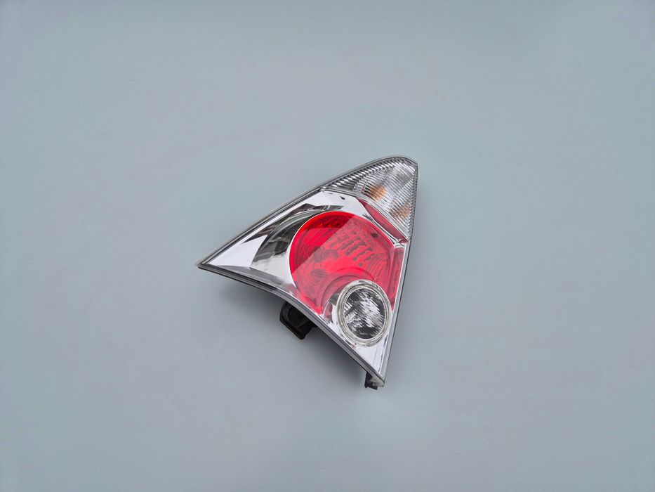 Lewa Tylna Tył Lampa Reflektor Daihatsu YRV Kompletna Europa Oryginał