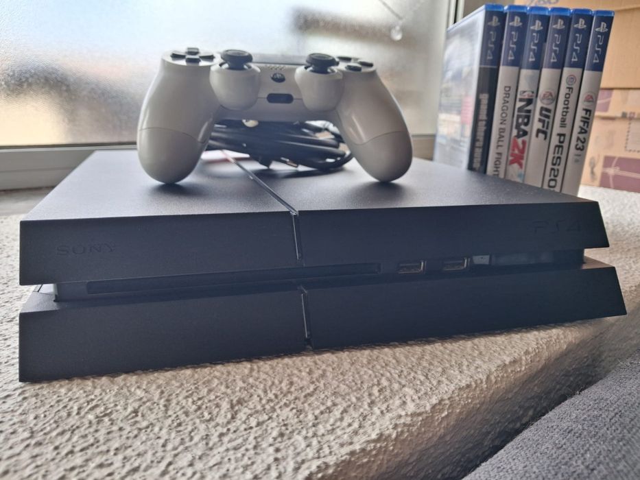 PS4 + Comando + 6 Jogos – Pronta a jogar