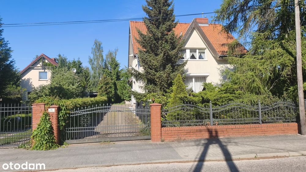 Dom wolnostojący 200 m² na działce 1334 m² z garażem w Szamotułach.