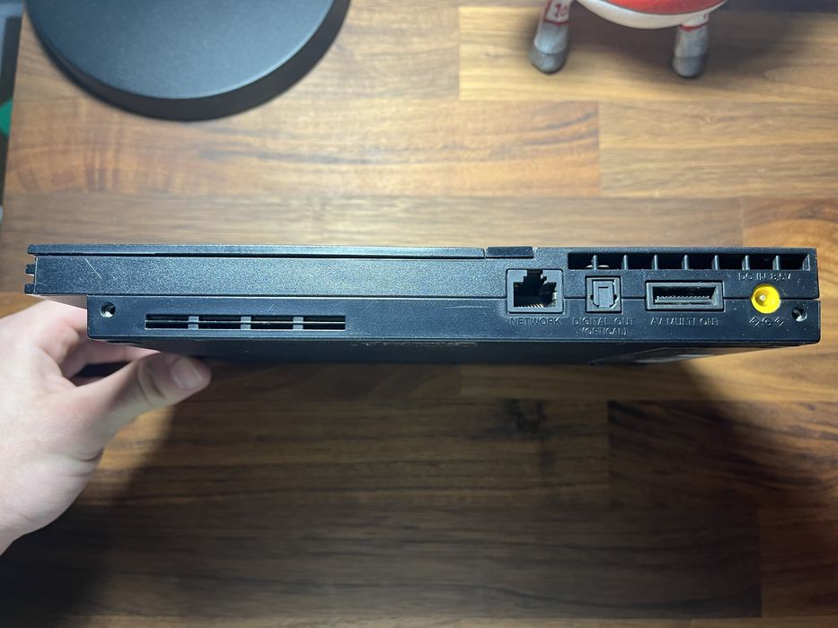 Playstation 2 com comando e acessorio para cantar