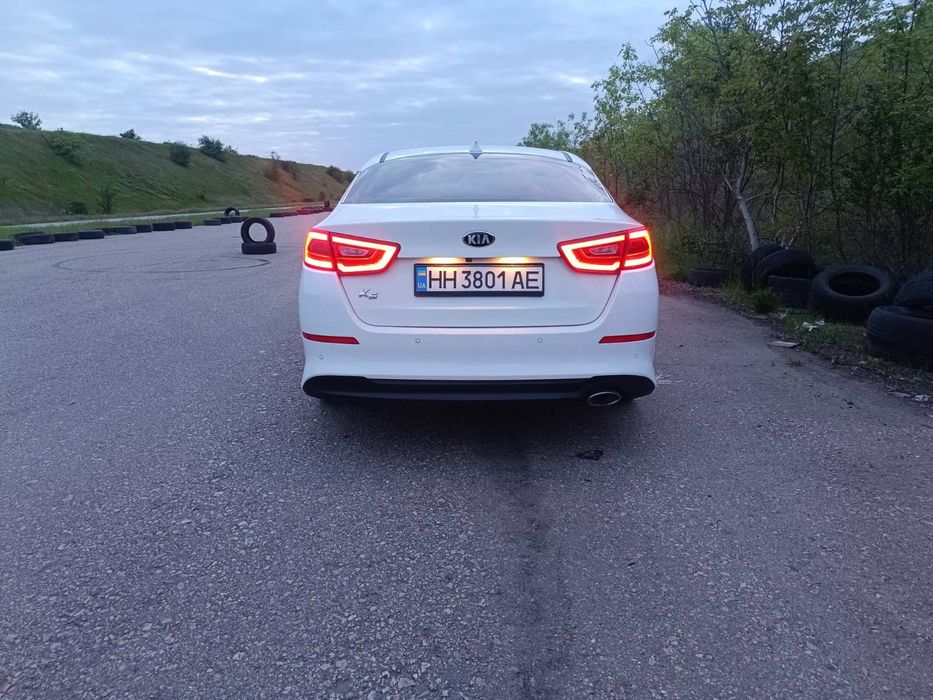 Kia K5 2014 VIN KNAGN418BFA557484 фото оголошення 7 з 8