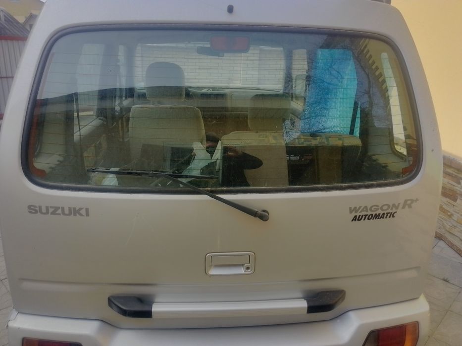 Двері автомобільні Сузукі вагон