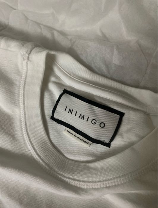 camisola branca inimigo