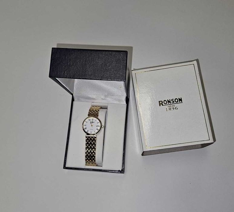 Relógio de senhora dourado