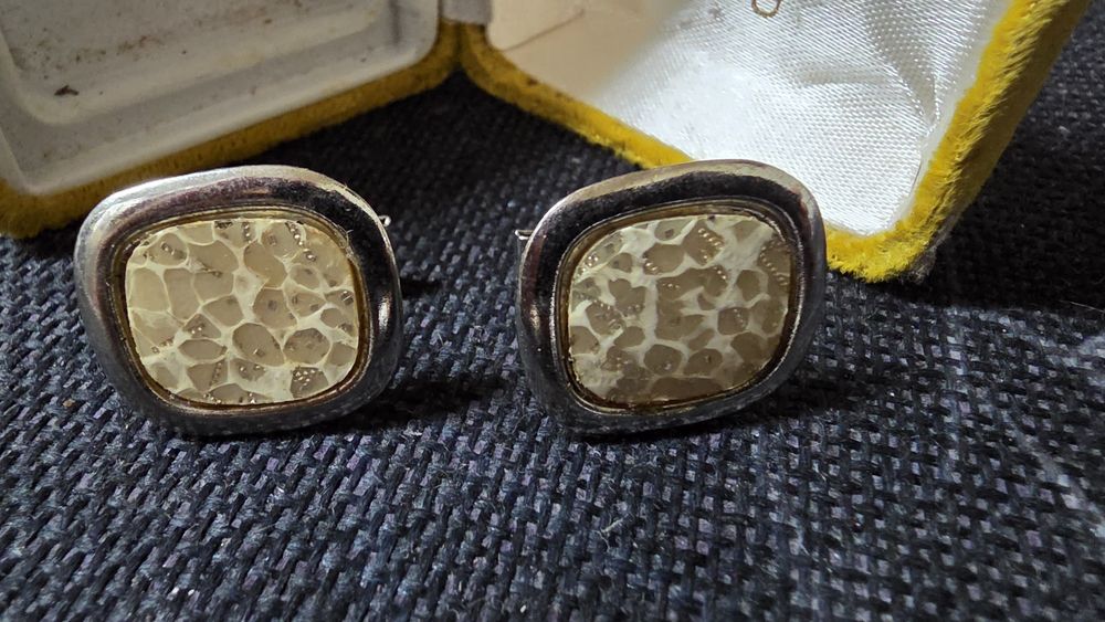 Botões de punho e alfinetes gravata