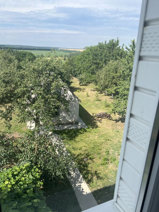 Продажа двоповерхового дуплекса - пів будинку - на Росі