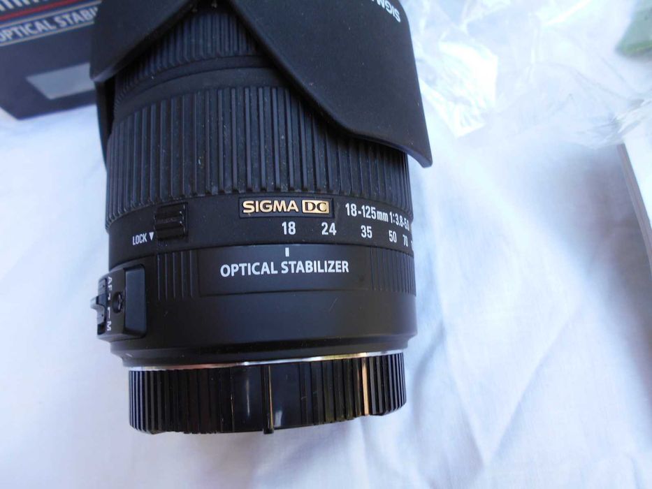 Объектив SIGMA 18-125 mm F3.8-5.6 DC OS