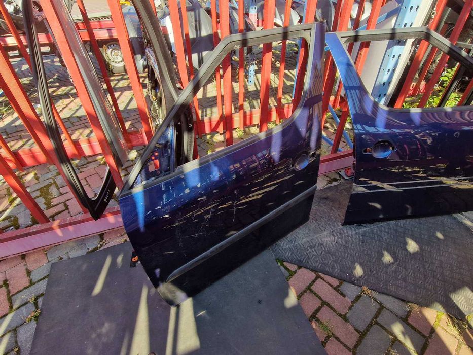 Дверь передняя Шкода Румстер 2006-2015