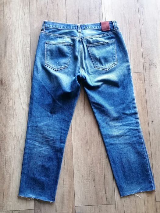 Jeansy z przetarciami Zara