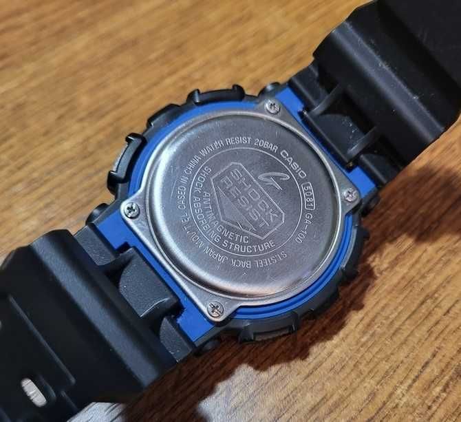 Casio G-Shock GA 100-1A2ER
Black/ Blue как новые