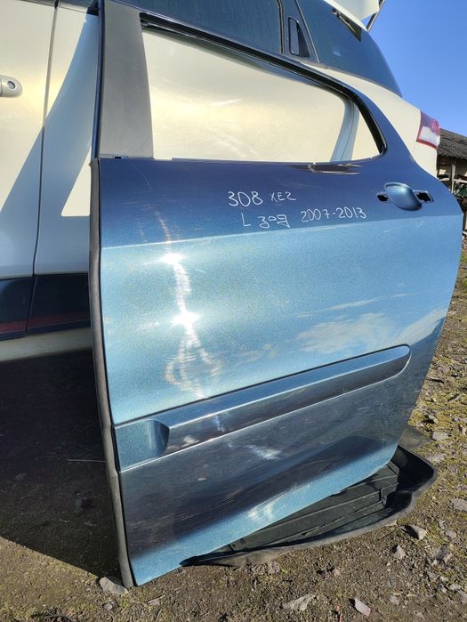 Peugeot 308 2007-2013 хечбек двері ліві задні