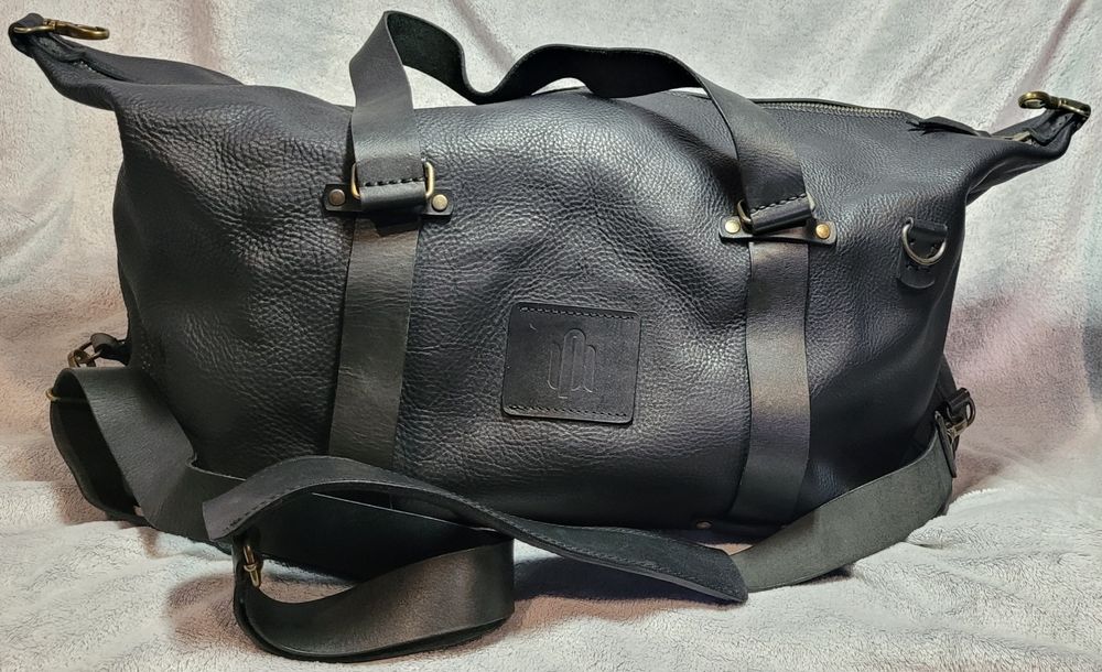 Дорожня шкіряна чорна сумка