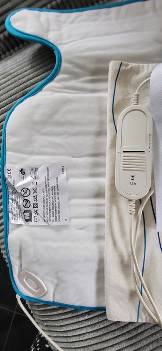 Poduszka ,koc rozgrzewający   nowy + gratis używany
