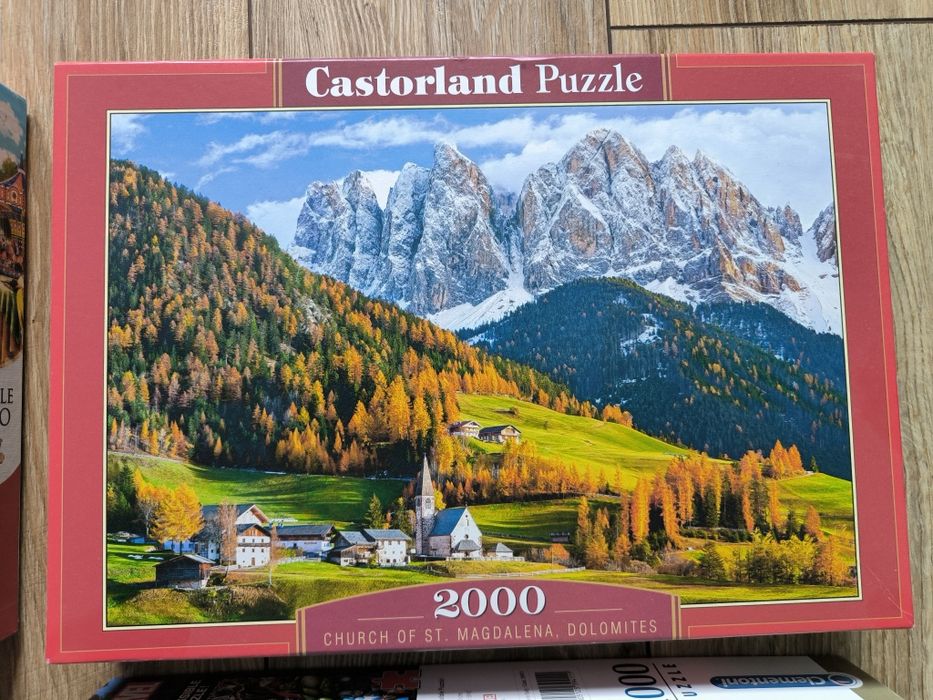 5 pudełek puzzli plus cztery antyramy do nich