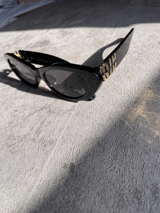 Óculos Miu Miu Pretos Sol
