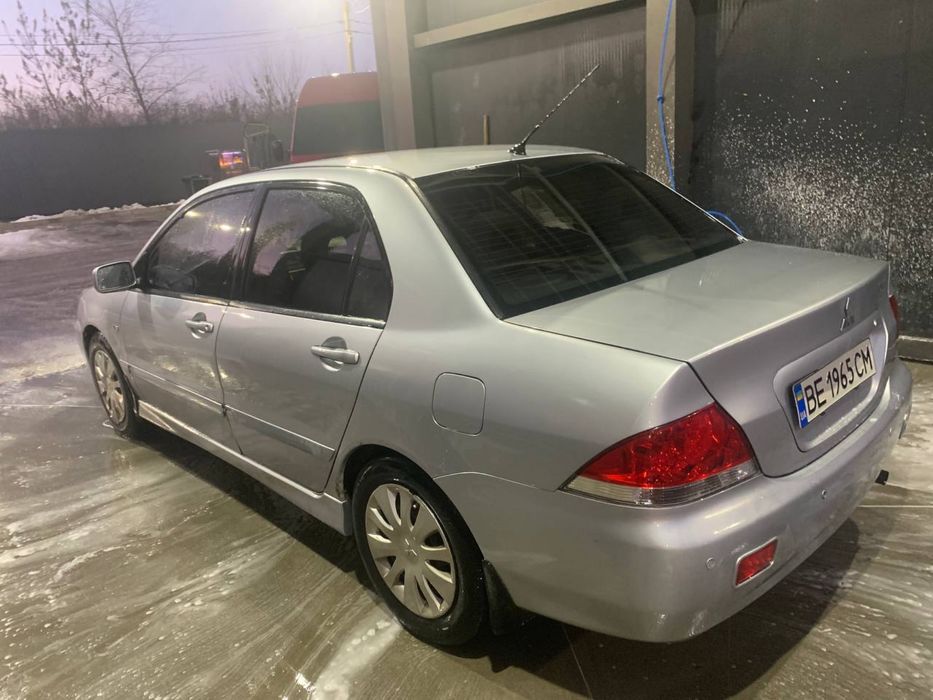 Лансер 1,6 бензин