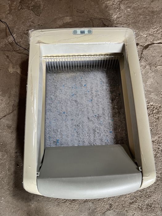 Caixa de areia automatica